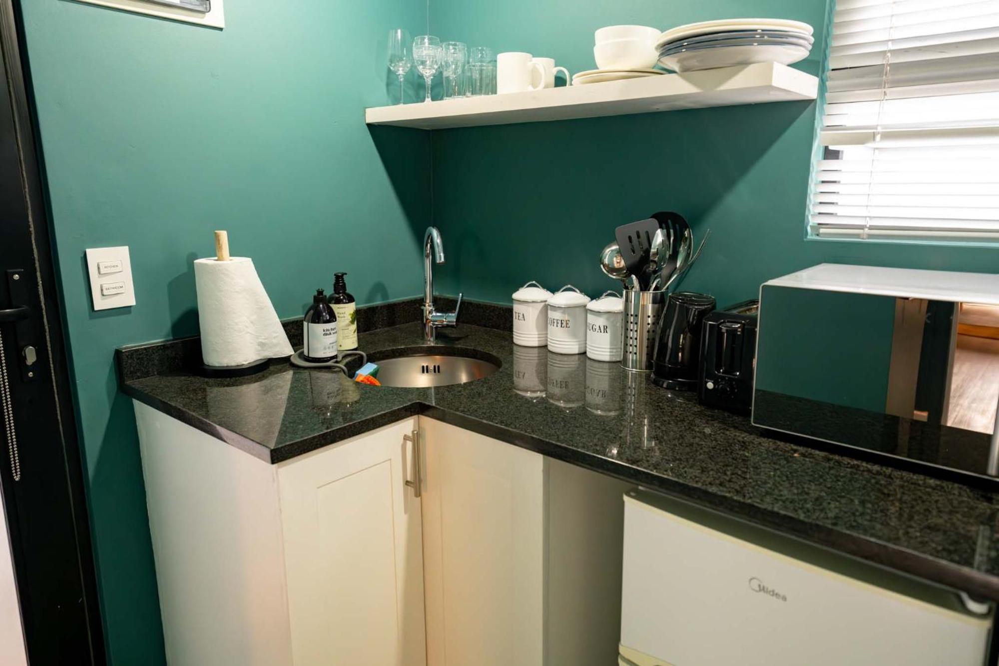 Point's Snug - Indulge In An Urban Oasis Appartement *